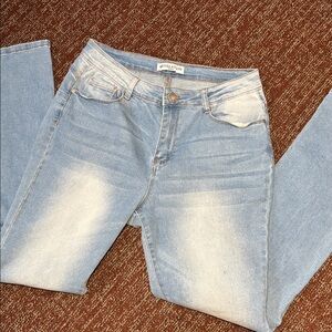 Revelation Denim light wash bootcut jeans distressed wash jeans women’s 10